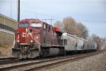 Eastbound manifest eases down the siding